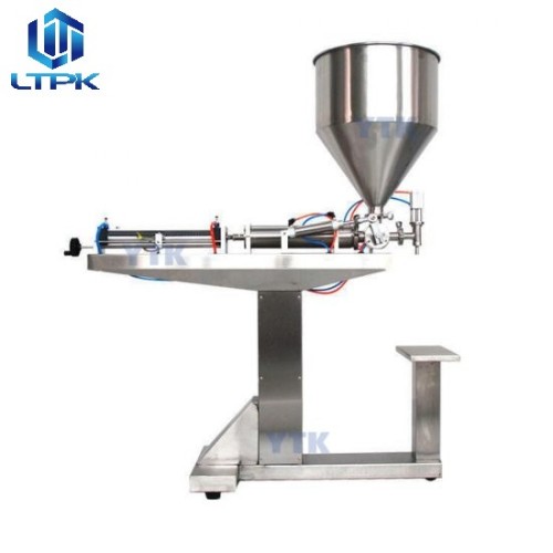 Vertical pneumatic viscous liquid filler